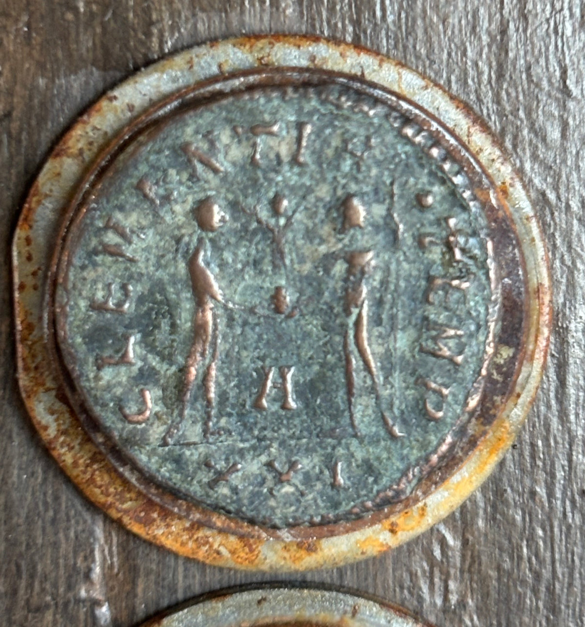 The top ancient Roman coin is dated from 275 to 285 AD. 