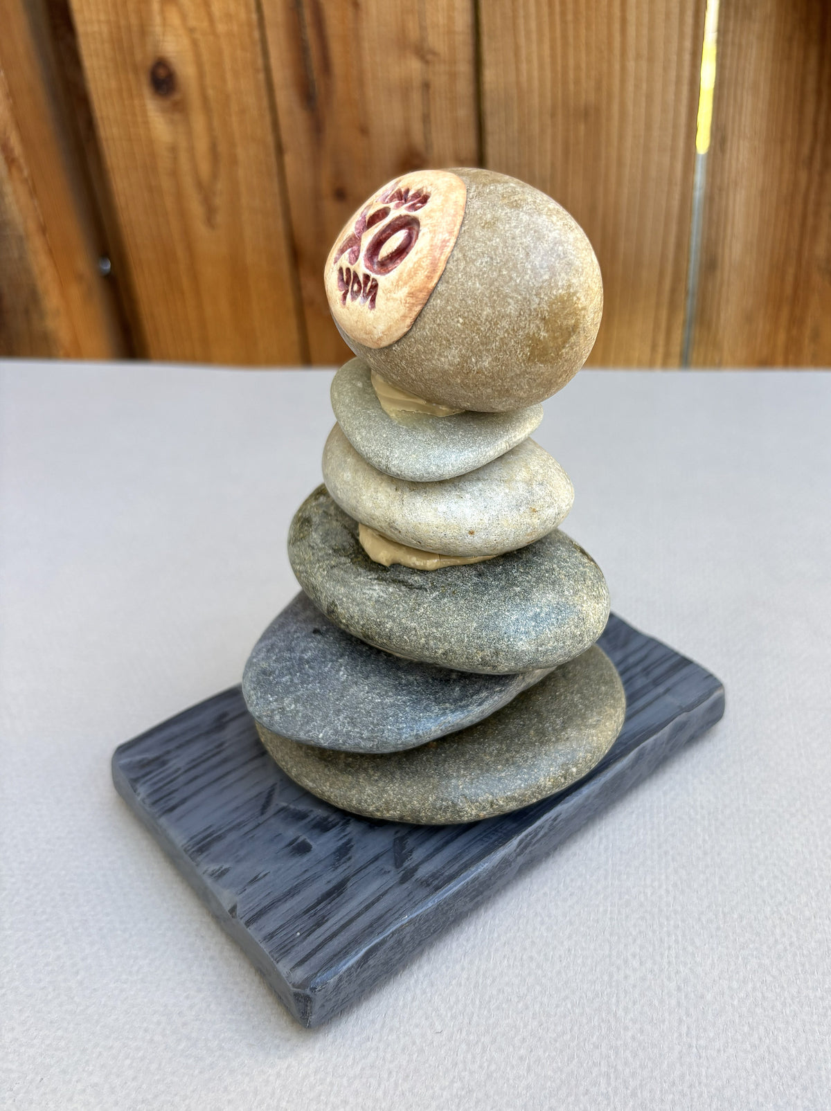 A small stack stone cairn sculpture by Robert Schott