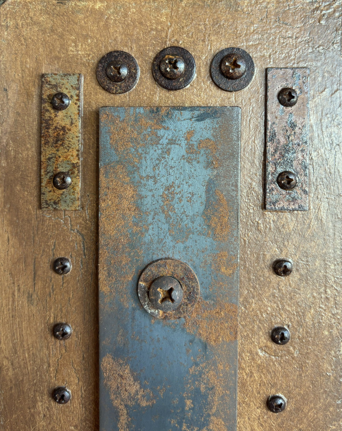 aged steel, hardware, wood, from the sculpture by Robert Schott called Great Empires.