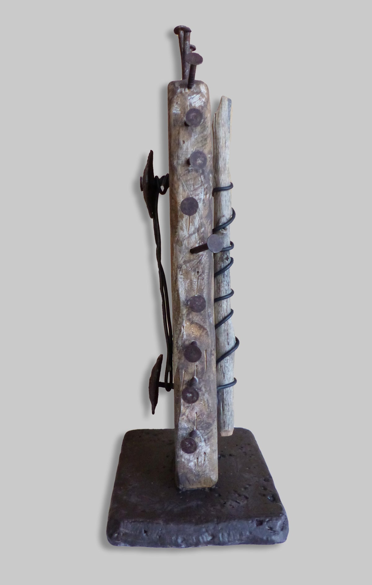 side view of rustic  wabi-sabi sculpture by Robert Schott