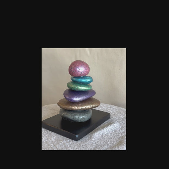 Short video of a jeweled tone river rock sculpture by Robert Schott