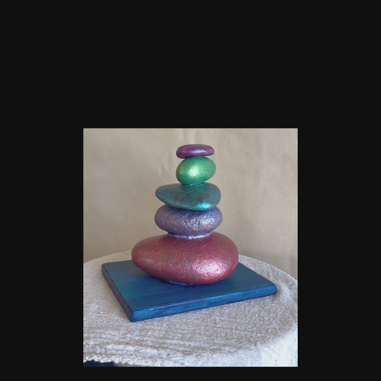 Short video of a rock sculpture turning around.