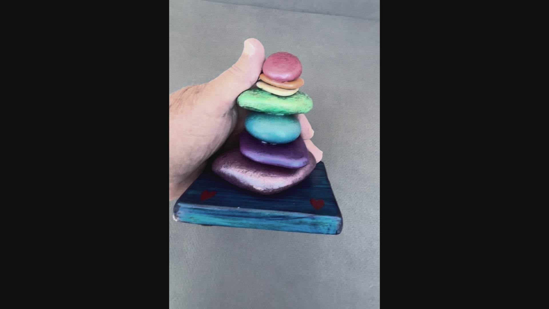 Video of jeweled tone stacked stones