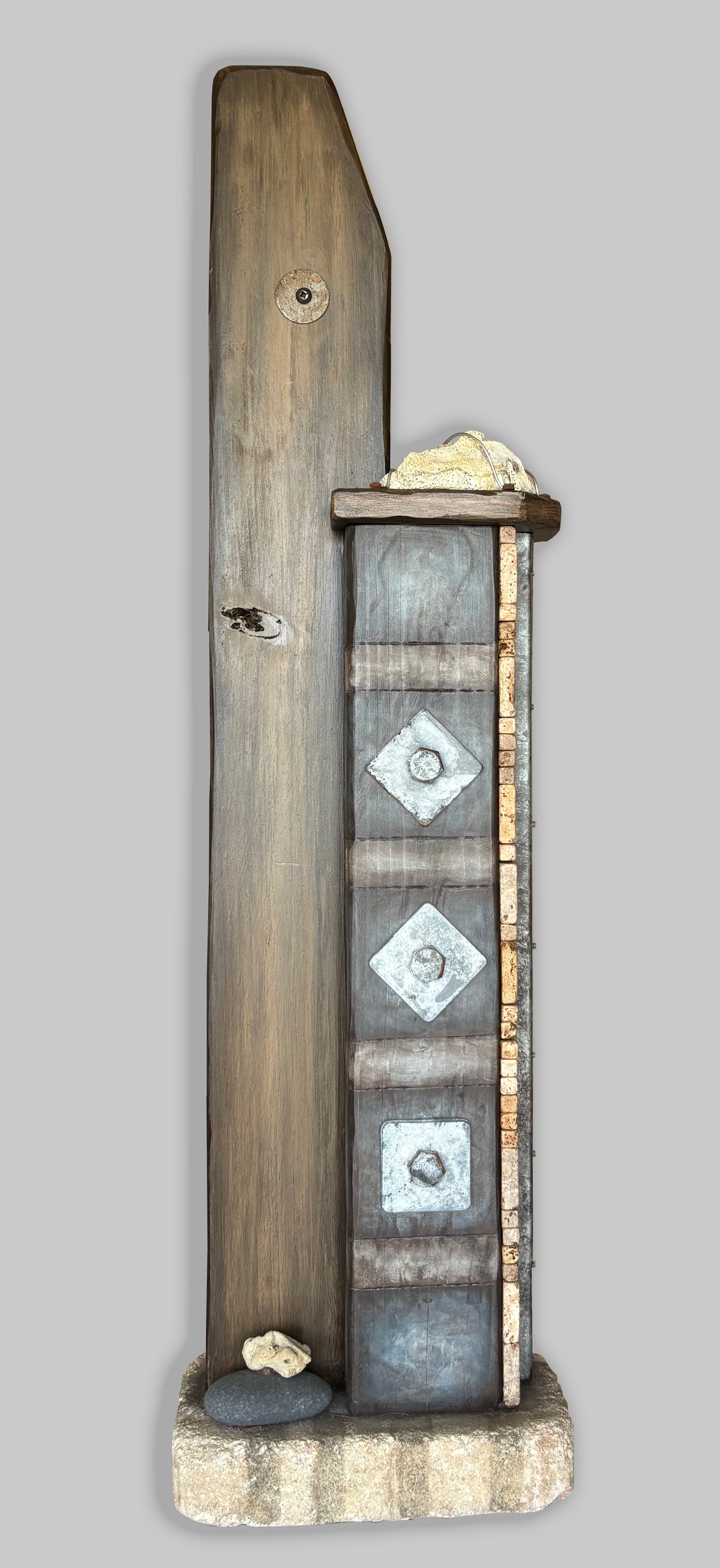 Beautiful found object sculpture inspired by  Wabi-Sabi aesthetic by Robert Schott