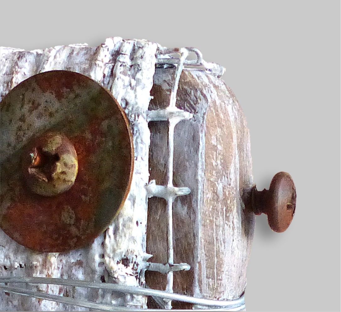 Detailed view of a rustic sculpture by Robert Schott