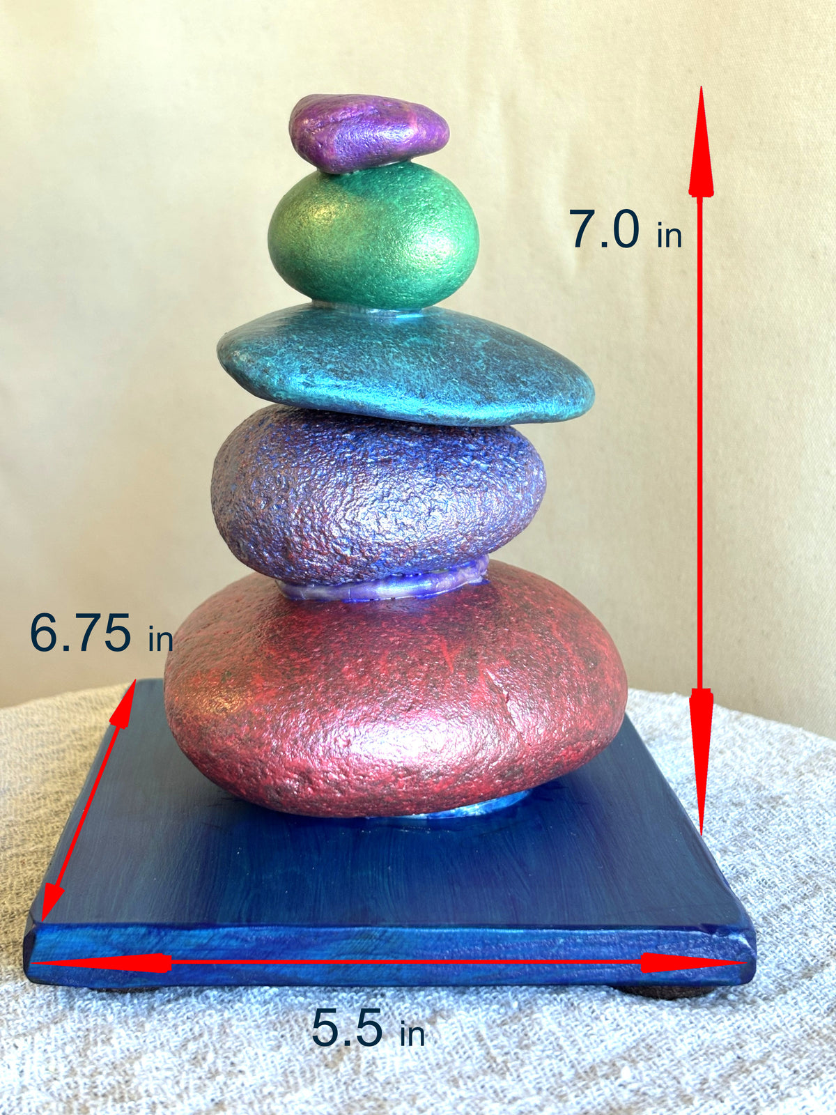 Dimensions in inches of a jewel toned stacked river rock sculpture by Robert Schott