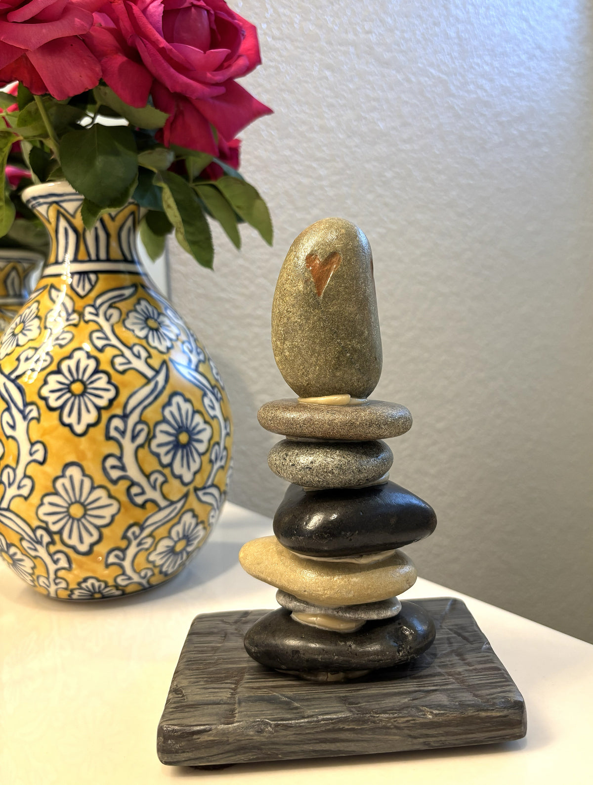Stacked small cairn showing the relative size on a countertop. 