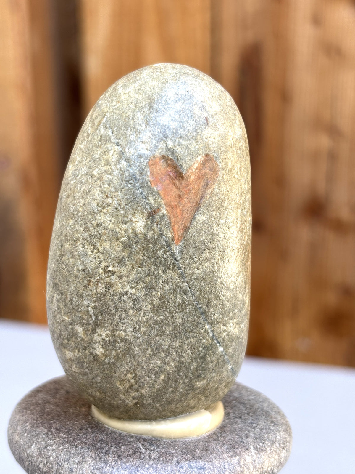 etched heart on river rock