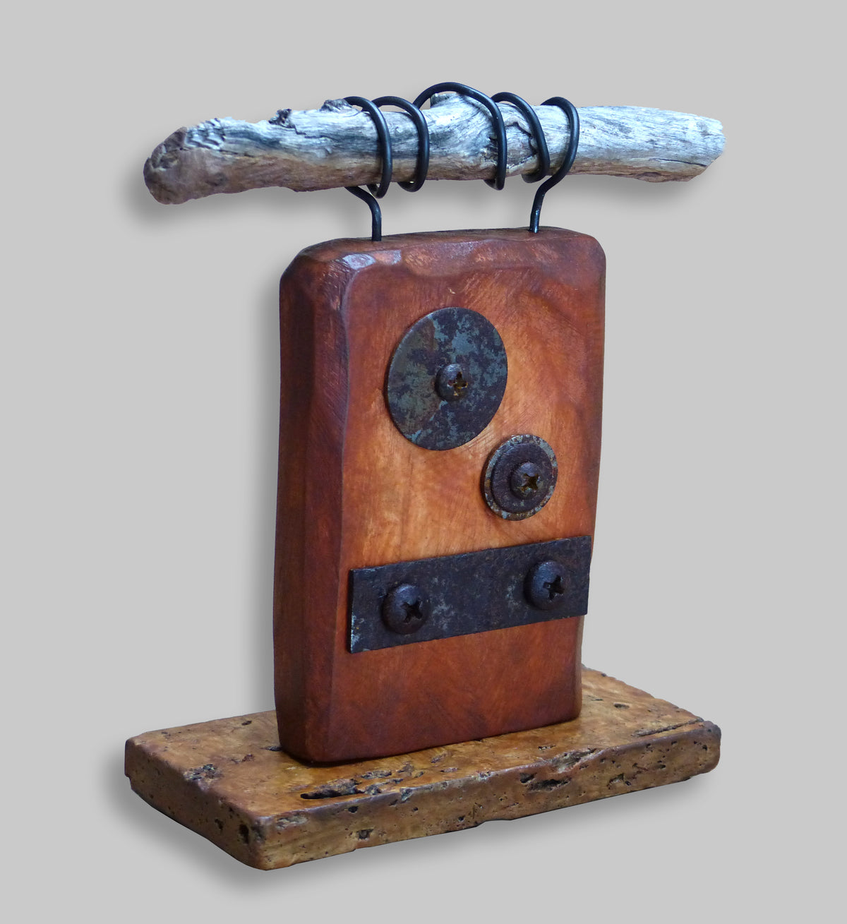 Rustic sculpture inspired by the ancient Japanese aesthetic of Wabi-Sabi by Robert Schott. This work has aged metal and found objects.